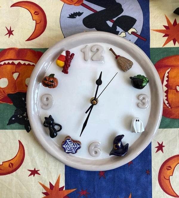 Clock with seasonal magnet charms